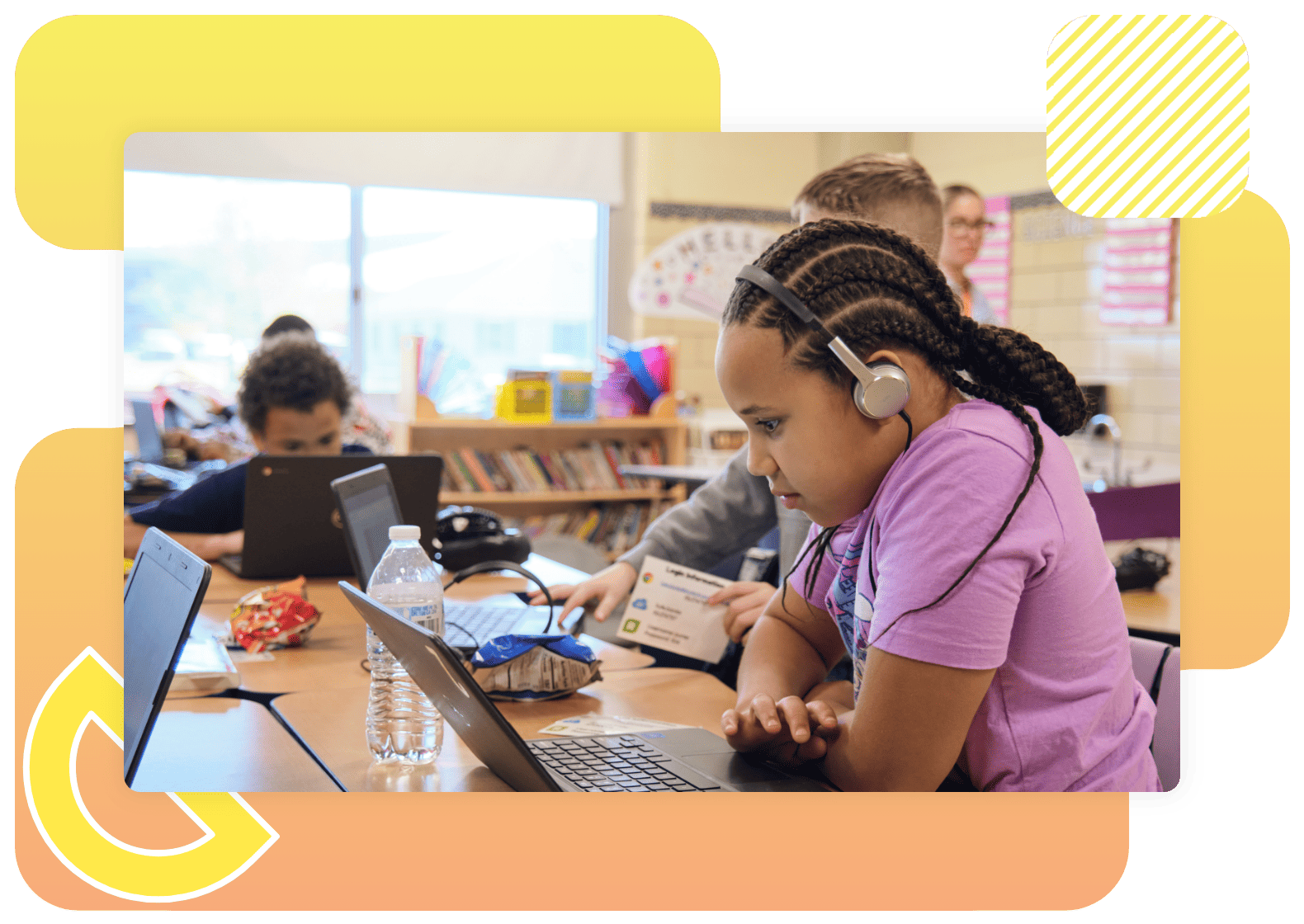 Children sitting at tables in a math classroom, using laptops and wearing headphones. One child in the foreground is focused on their screen, possibly exploring engaging math programs, while others in the background are also immersed in their devices.