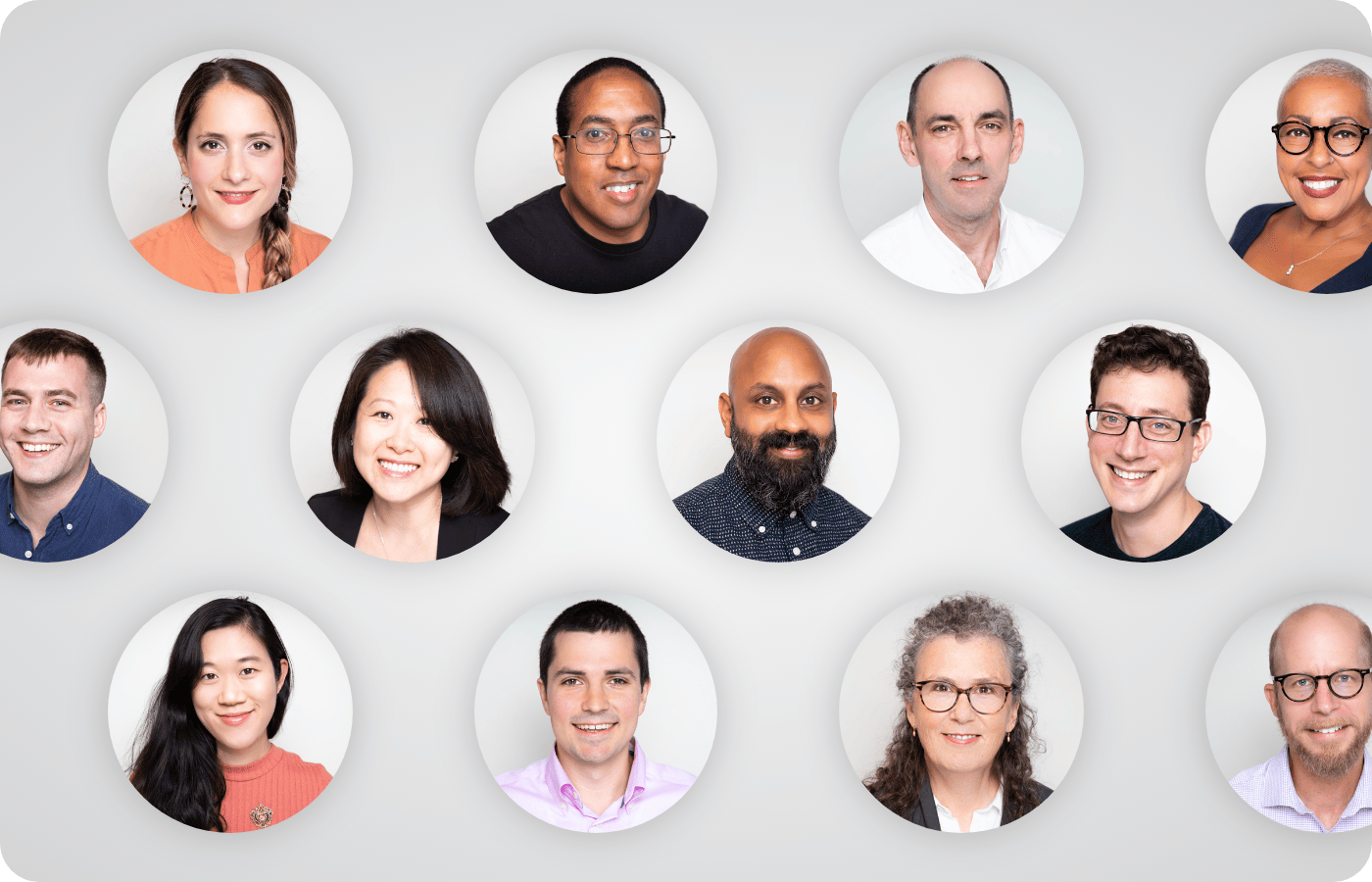 Image showing headshots of thirteen diverse adults, each smiling, against a neutral background.